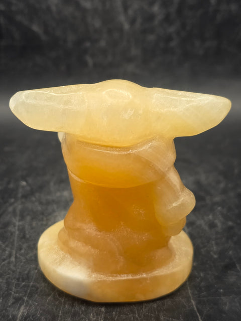 Orange calcite yoda! 4.4 ounces, 2.4 inches tall