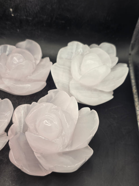 Mangano calcite flower carving! Uv reactive! 5.4 ounces, 2.6 inches