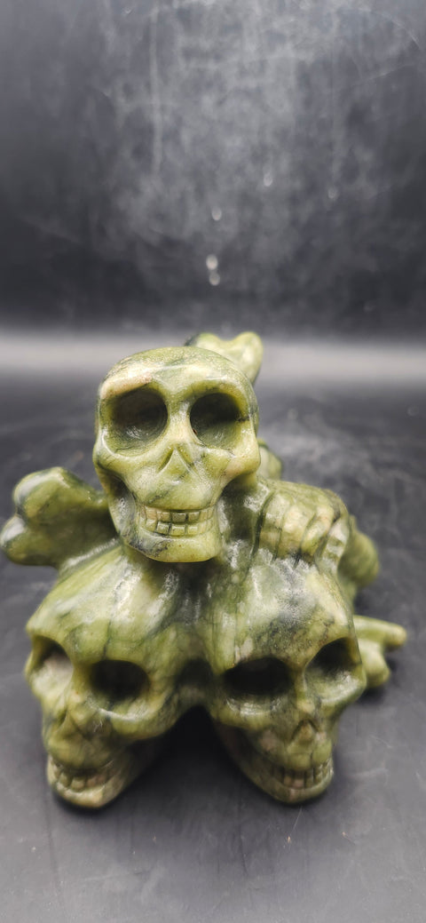 Nephrite jade skull and crossbones 12.5 ounces, 3.3" long