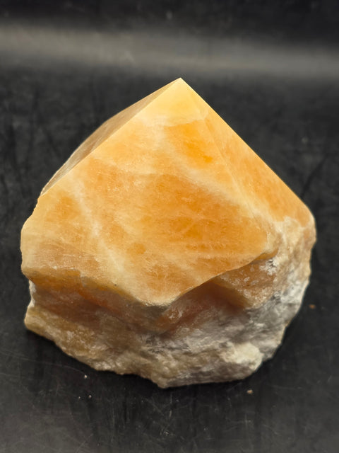 Orange calcite polished top point! 1 pound, 3.1 inches tall, 2.7 inches wide