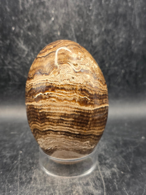 Chocolate calcite lingam! 15.6 ounces, 3.5 inches tall, 2.3" wide