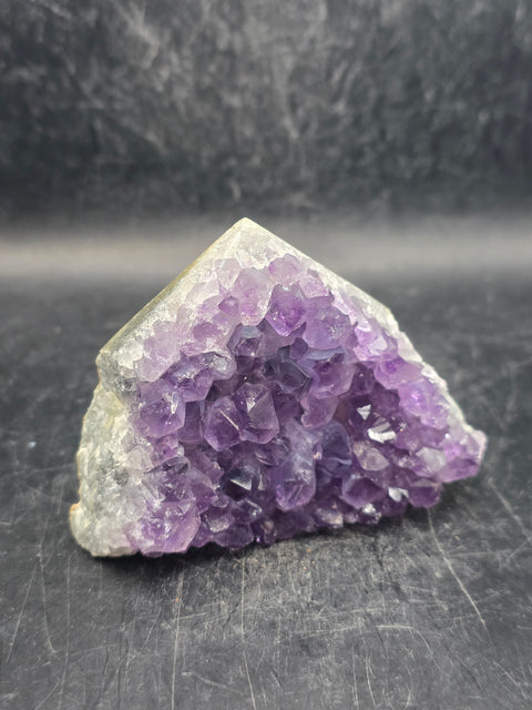 Amethyst polished top point! 6 ounces, 2.3 inches tall, 3.3" wide