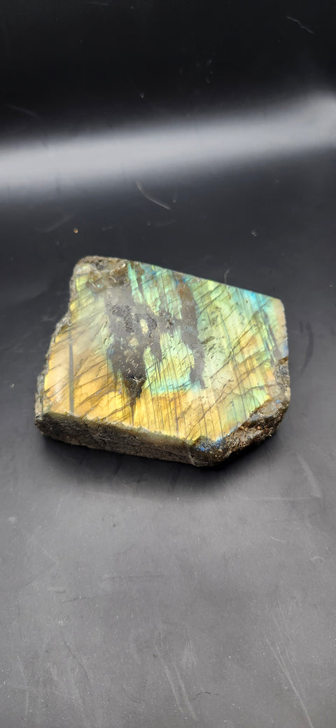 One side polished labradorite freeform. 9.3 ounces, 2.9 by 2.7 inches