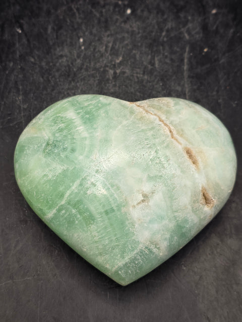 Caribbean calcite heart! 5.7 ounces, 2.7 inches tall, 2.4" wide