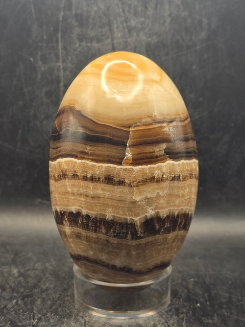 Chocolate calcite lingam! 1.6 pounds, 4.2 inches tall, 2.5" wide!