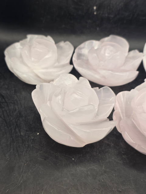 Mangano calcite flower carving! Uv reactive! 5.4 ounces, 2.6 inches