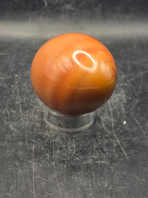 Carnelian agate egg! 6 ounces, 2.3 inches tall, 1.8 inches wide