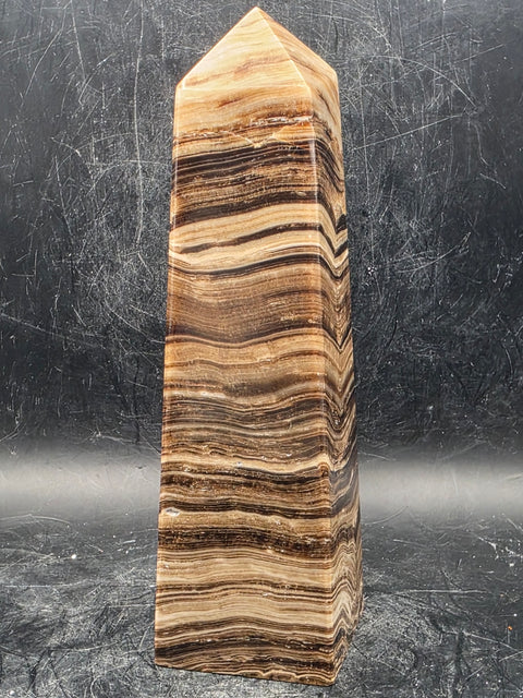 Chocolate calcite tower! 15 ounces, 5.5 inches tall, 1.6" wide