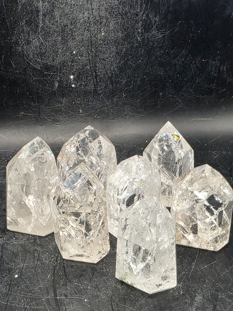 Cracked quartz polished point! 1.7 to 2 inches tall!