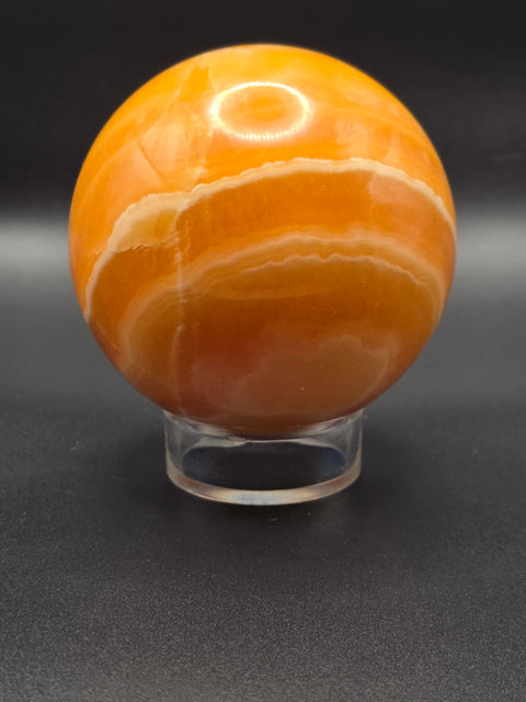 Large orange calcite sphere! 82.6mm, 3.2 inches, 1.12 pounds