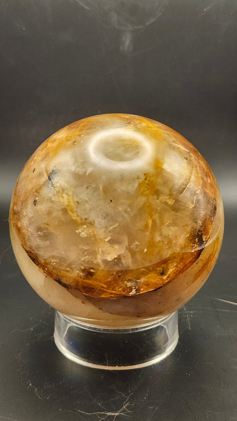 Ferruginous quartz sphere. 71.6mm, 2.82 inches, 1.2 pounds