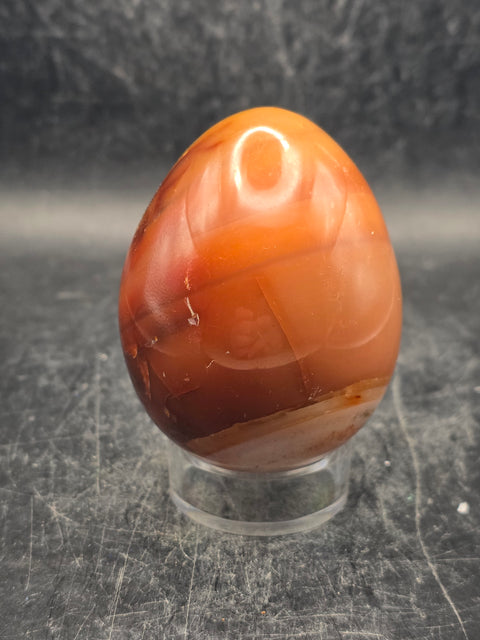 Carnelian agate egg! 6 ounces, 2.3 inches tall, 1.8 inches wide