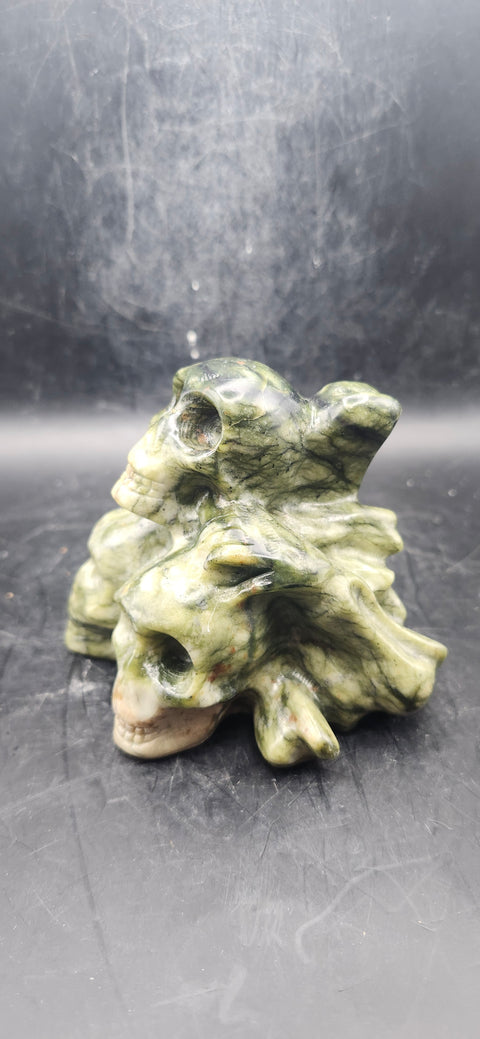 Nephrite jade skull and crossbones 12.5 ounces, 3.3" long