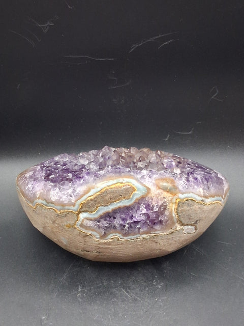 Super seven amethyst egg! 1.13 pounds, 4.8 inches by 3.5"