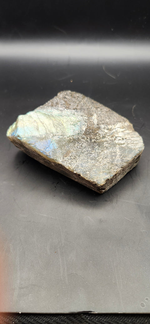 One side polished labradorite freeform. 9.3 ounces, 2.9 by 2.7 inches