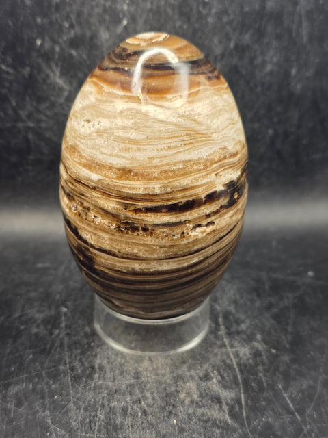 Chocolate calcite lingam! 1.6 pounds, 4.1 inches tall, 2.5" wide