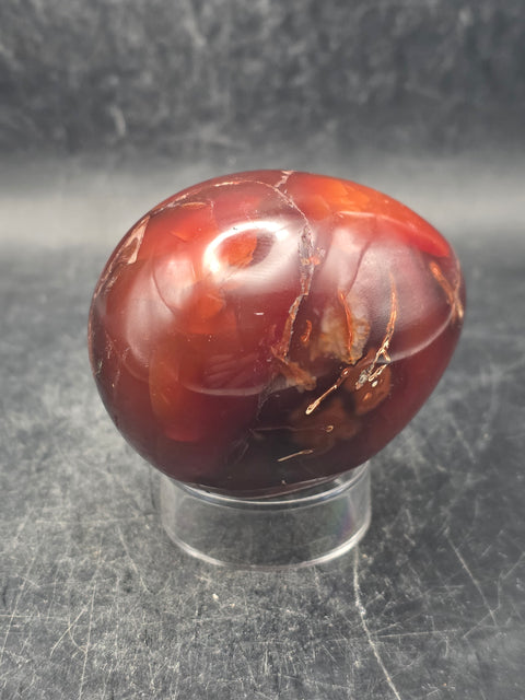 Carnelian agate egg! 5.5 ounces, 2.2 inches tall, 1.7 inches wide