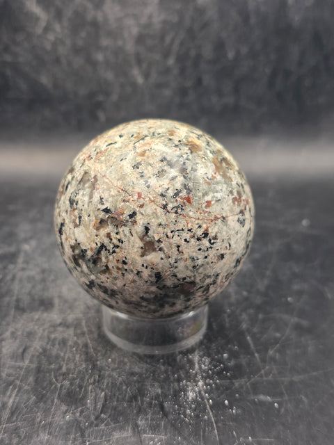 Flame stone sphere "yooperlite" 55mm, 2.1 inches, 7.7 ounces
