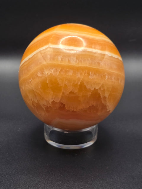 Large orange calcite sphere! 82.6mm, 3.2 inches, 1.12 pounds