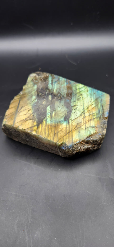 One side polished labradorite freeform. 9.3 ounces, 2.9 by 2.7 inches