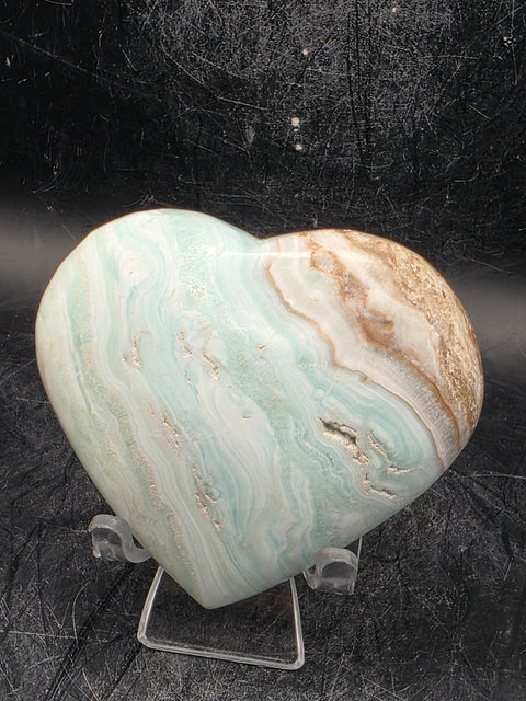 Caribbean calcite heart! 6.8 ounces, 3 inches wide, 2.6 tall