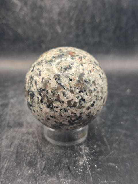 Flame stone sphere "yooperlite" 55mm, 2.1 inches, 7.7 ounces