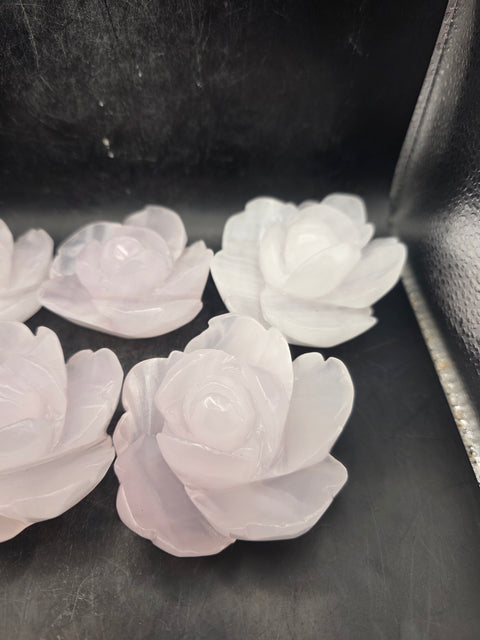 Mangano calcite flower carving! Uv reactive! 5.4 ounces, 2.6 inches