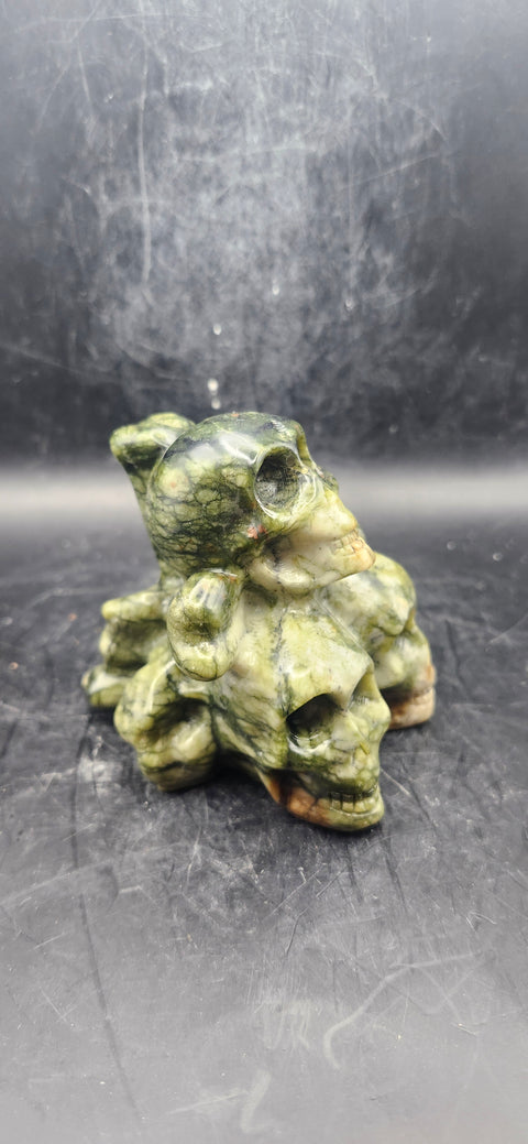 Nephrite jade skull and crossbones 12.5 ounces, 3.3" long