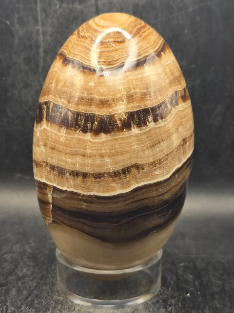 Chocolate calcite lingam! 1.6 pounds, 4.2 inches tall, 2.5" wide!