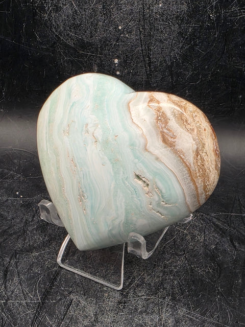 Caribbean calcite heart! 6.8 ounces, 3 inches wide, 2.6 tall