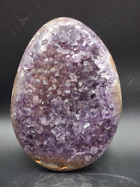 Super seven amethyst egg! 1.13 pounds, 4.8 inches by 3.5"