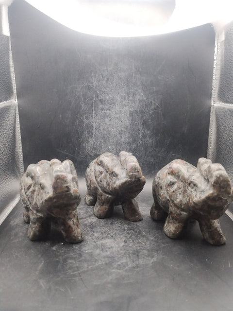 Flame stone "yooperlite" elephant! One pound, 4 inches long, 2" wide