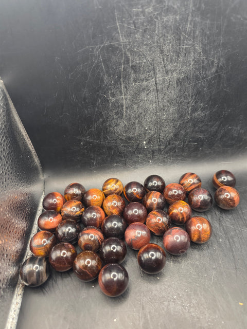 Mini 22mm, .8 inch red tiger eye sphere!