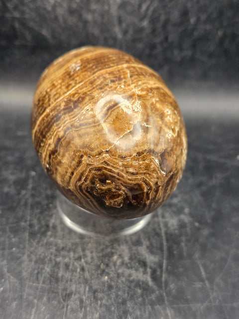 Chocolate calcite lingam! 15.6 ounces, 3.5 inches tall, 2.3" wide