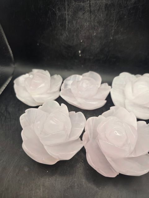 Mangano calcite flower carving! Uv reactive! 5.4 ounces, 2.6 inches