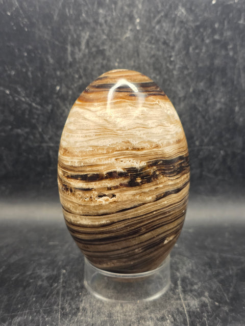 Chocolate calcite lingam! 1.6 pounds, 4.1 inches tall, 2.5" wide