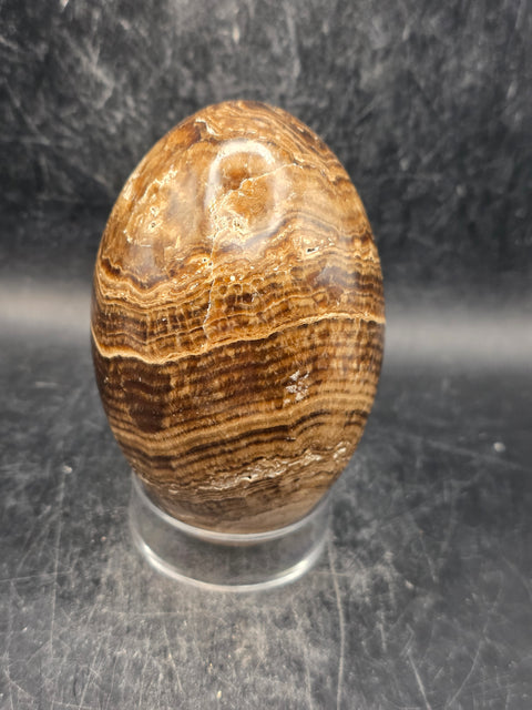 Chocolate calcite lingam! 15.6 ounces, 3.5 inches tall, 2.3" wide