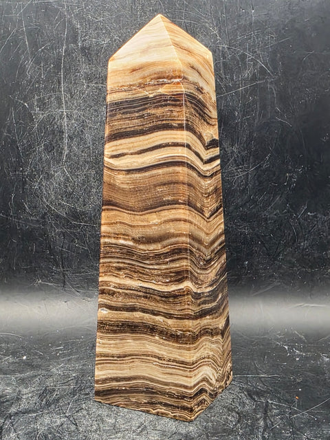 Chocolate calcite tower! 15 ounces, 5.5 inches tall, 1.6" wide