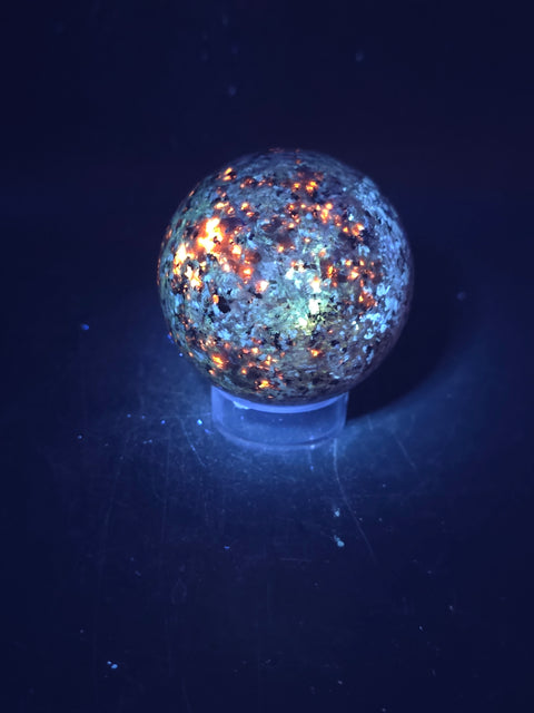 Flame stone sphere "yooperlite" 55mm, 2.1 inches, 7.7 ounces