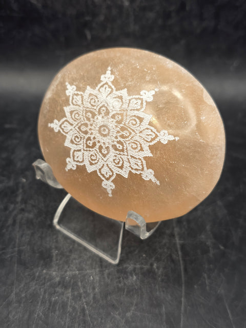Peach selenite mandala etched palm stone! 2.5 inches wide