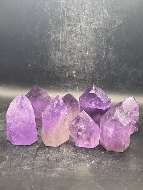 Grade AA amethyst polished point! 2 to 3 ounces!!!