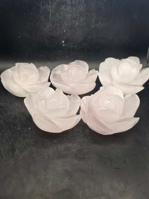 Mangano calcite flower carving! Uv reactive! 5.4 ounces, 2.6 inches