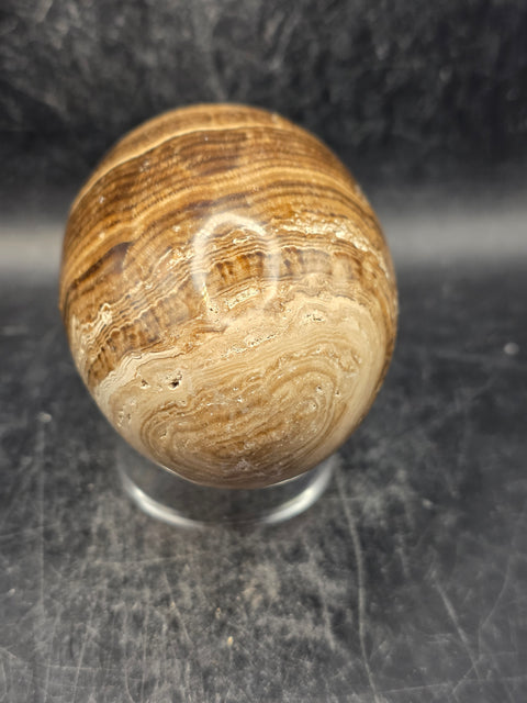 Chocolate calcite lingam! 15.6 ounces, 3.5 inches tall, 2.3" wide