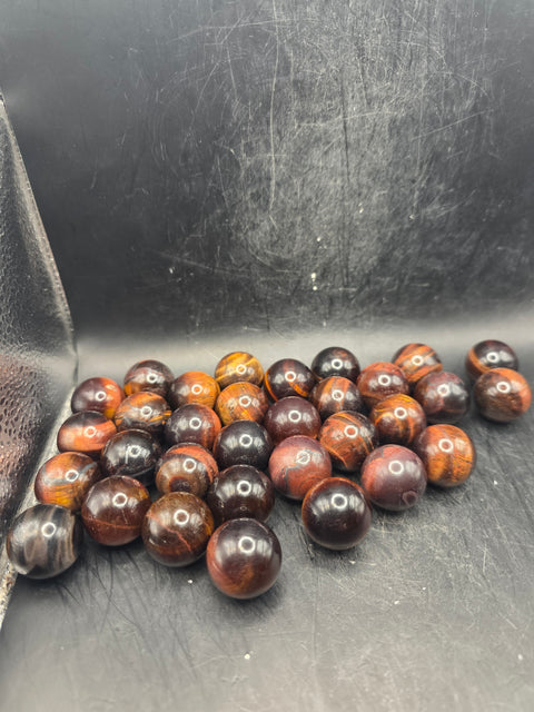 Mini 22mm, .8 inch red tiger eye sphere!