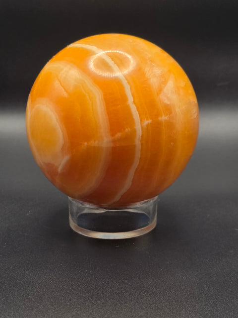 Large orange calcite sphere! 82.6mm, 3.2 inches, 1.12 pounds