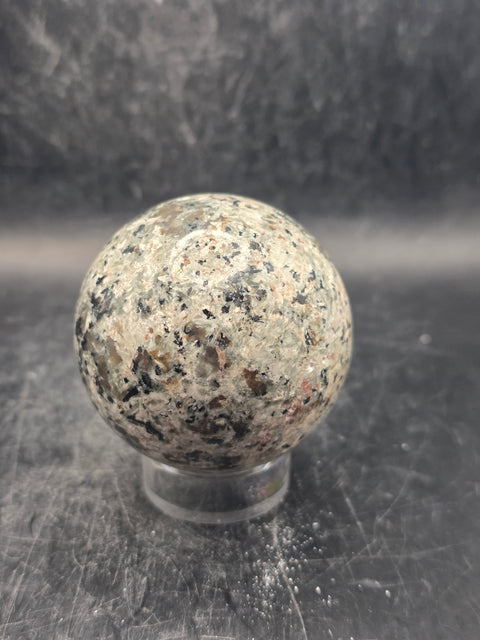 Flame stone sphere "yooperlite" 55mm, 2.1 inches, 7.7 ounces