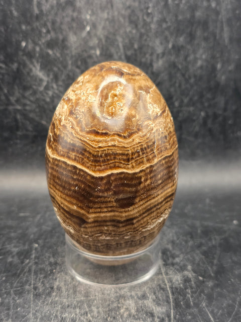 Chocolate calcite lingam! 15.6 ounces, 3.5 inches tall, 2.3" wide