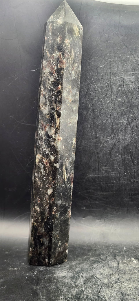 Large Astrophyllite garnet firework tower 8 inches tall, 14 ounces