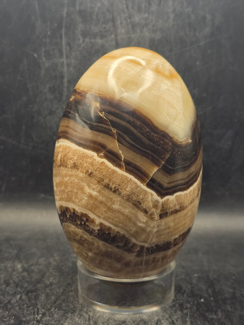 Chocolate calcite lingam! 1.6 pounds, 4.2 inches tall, 2.5" wide!