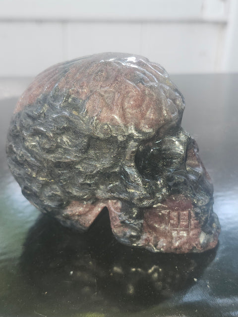Astrophyllite garnet skull! 1.2 pound, 3.3 inches long, 2.8 tall, 2.2 wide
